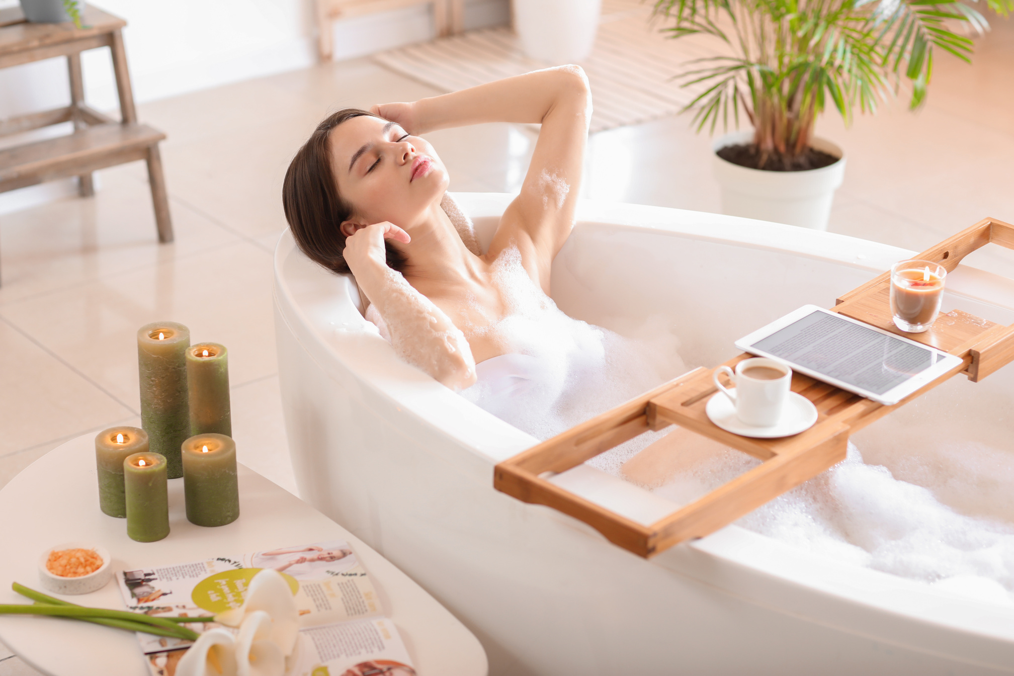 Young Woman Taking Relaxing Bath at Home